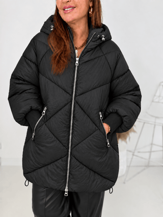 Steppjacke in Schwarz mit Kapuze mit Gummizug zum Raffen. Für Damen in Einheitsgröße 36-42 - Levelone GmbH & Co. KG