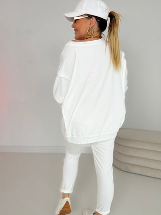 Sweater in Weiss mit pinkem Hey Print